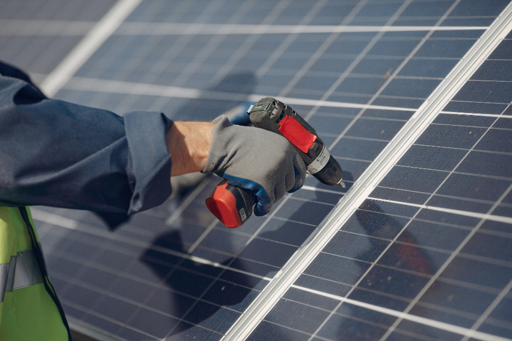 Solar panel installation by Excel Electric Co. on a commercial rooftop